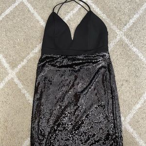 Black backless mini sequence dress.